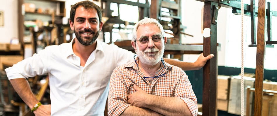 Portrait father & son in the company
