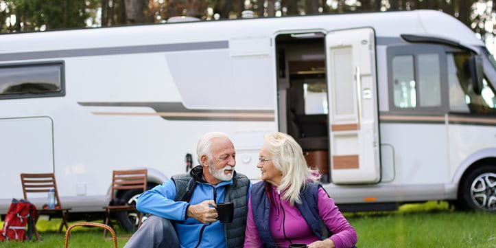 Smiling couple sitting at the table Smiling couple sitting at the table